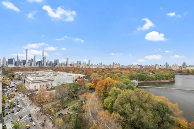 a view of swimming pool with outdoor seating