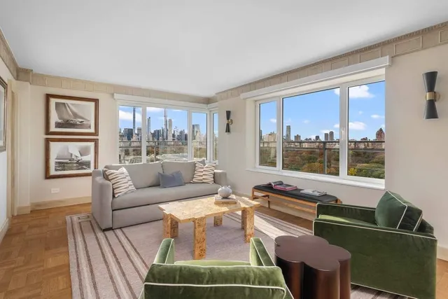a view of living room with furniture and window