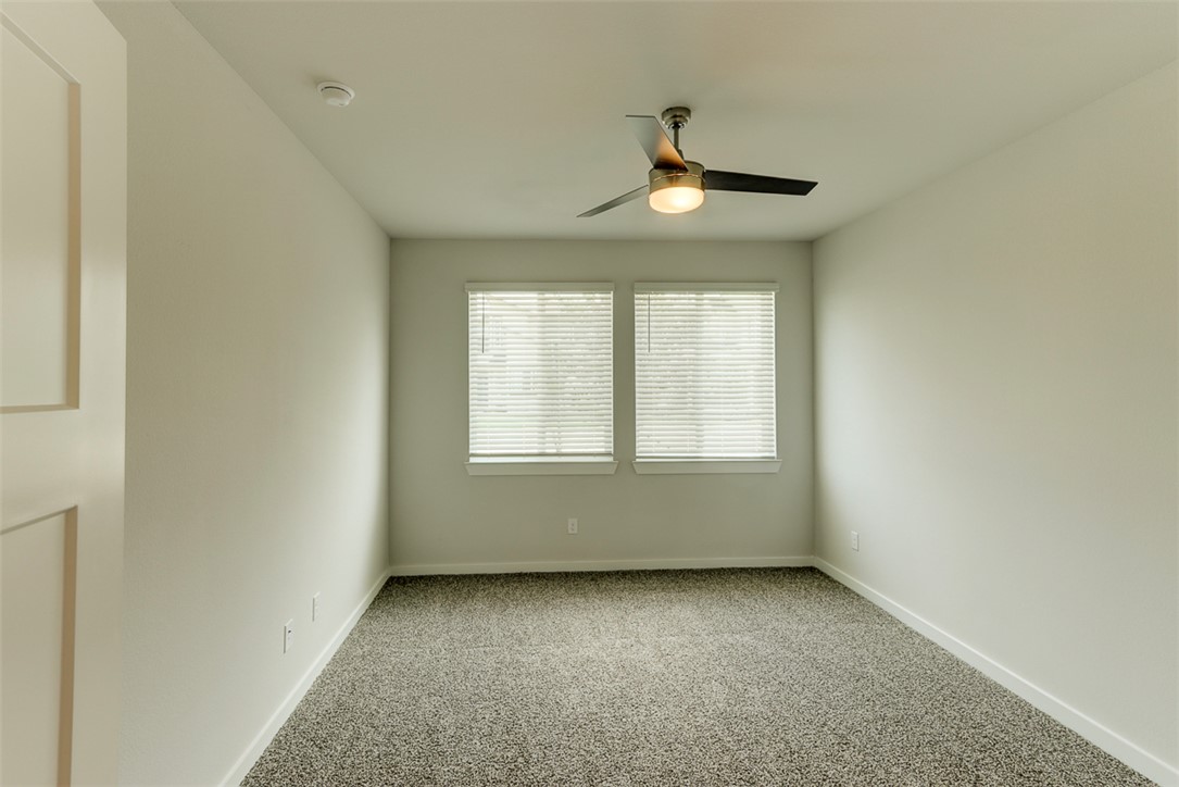 760 Double Mountain Road College Station, TX 77845 - Photo 10 of 26 an empty room with a window