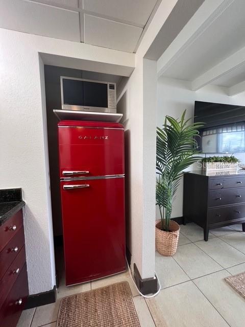 611 Destiny Drive, Unit 115 Ruskin, FL 33570 - Photo 13 of 28 a view of kitchen with furniture and refrigerator