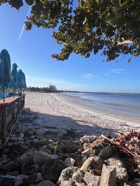 611 Destiny Drive, Unit 115 Ruskin, FL 33570 - Photo 19 of 28 a view of an ocean and beach