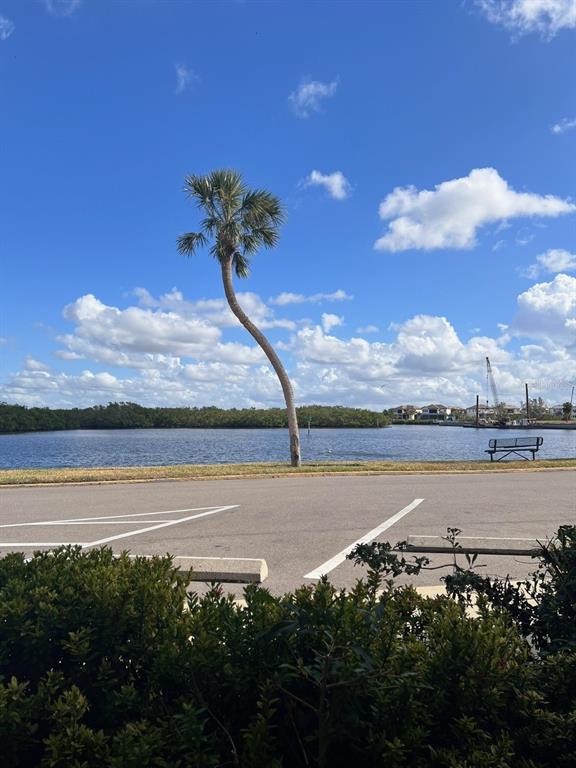 611 Destiny Drive, Unit 115 Ruskin, FL 33570 - Photo 2 of 28 a view of an ocean and beach