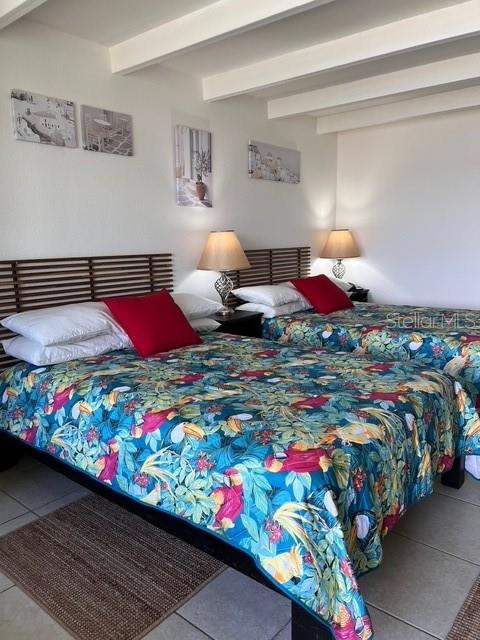 611 Destiny Drive, Unit 115 Ruskin, FL 33570 - Photo 4 of 28 a bedroom with bed and window