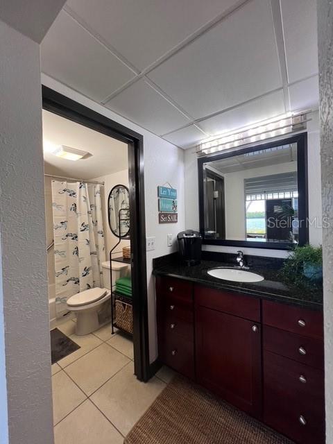 611 Destiny Drive, Unit 115 Ruskin, FL 33570 - Photo 7 of 28 a spacious bathroom with a double vanity sink a large mirror and a bathtub