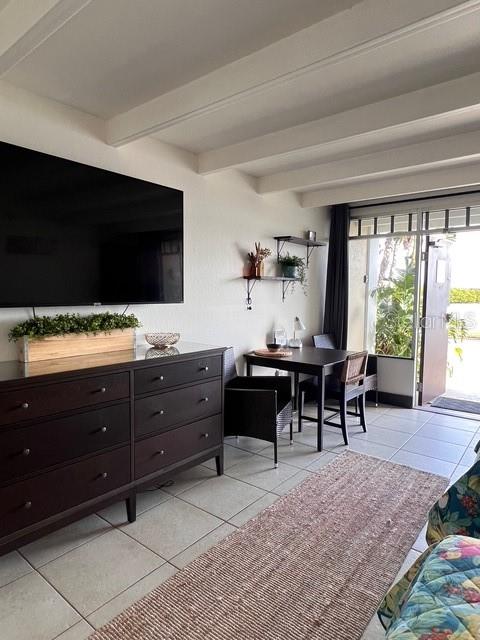 611 Destiny Drive, Unit 115 Ruskin, FL 33570 - Photo 10 of 28 a living room with furniture and a flat screen tv