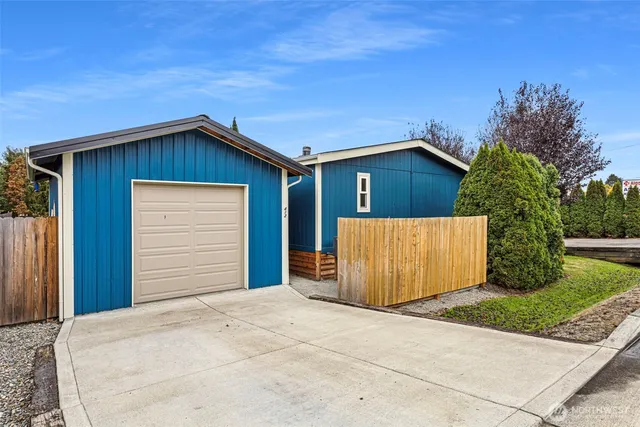 a front view of a house with garage