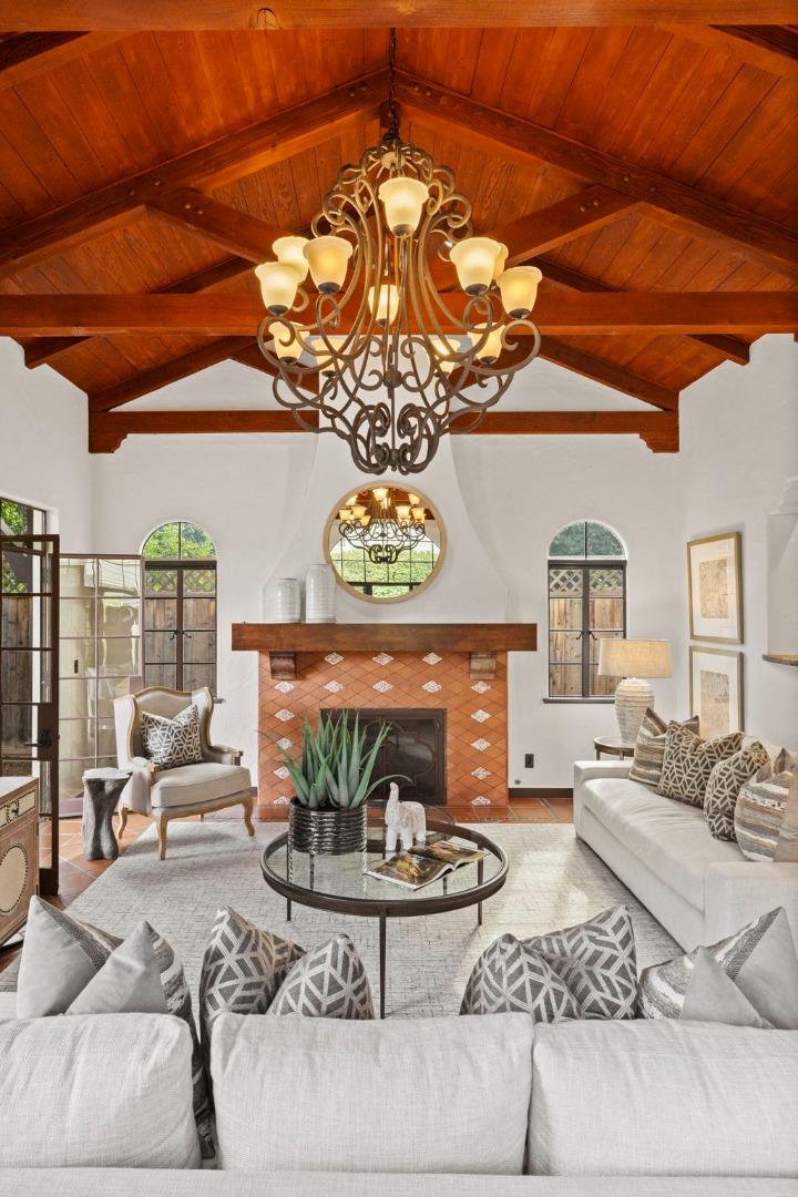 503 Arlington Road Redwood City, CA 94062 - Photo 15 of 48 a living room with furniture and a chandelier