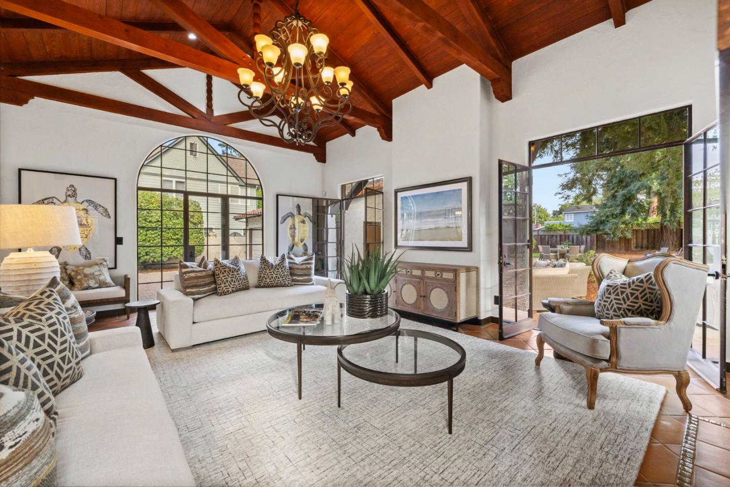 503 Arlington Road Redwood City, CA 94062 - Photo 16 of 48 a living room with furniture a chandelier and a large window