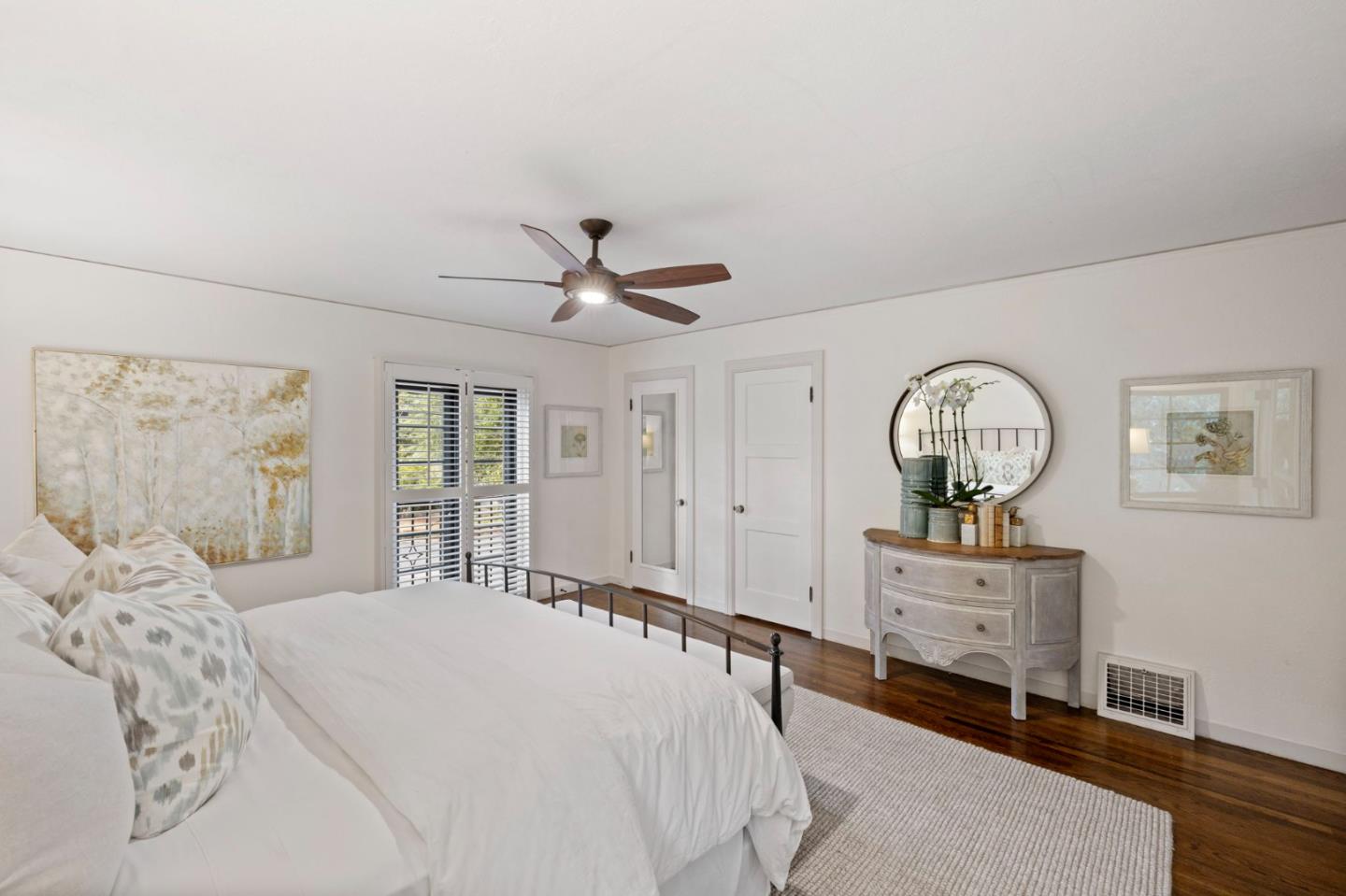 503 Arlington Road Redwood City, CA 94062 - Photo 24 of 48 a bedroom with a bed window and a mirror