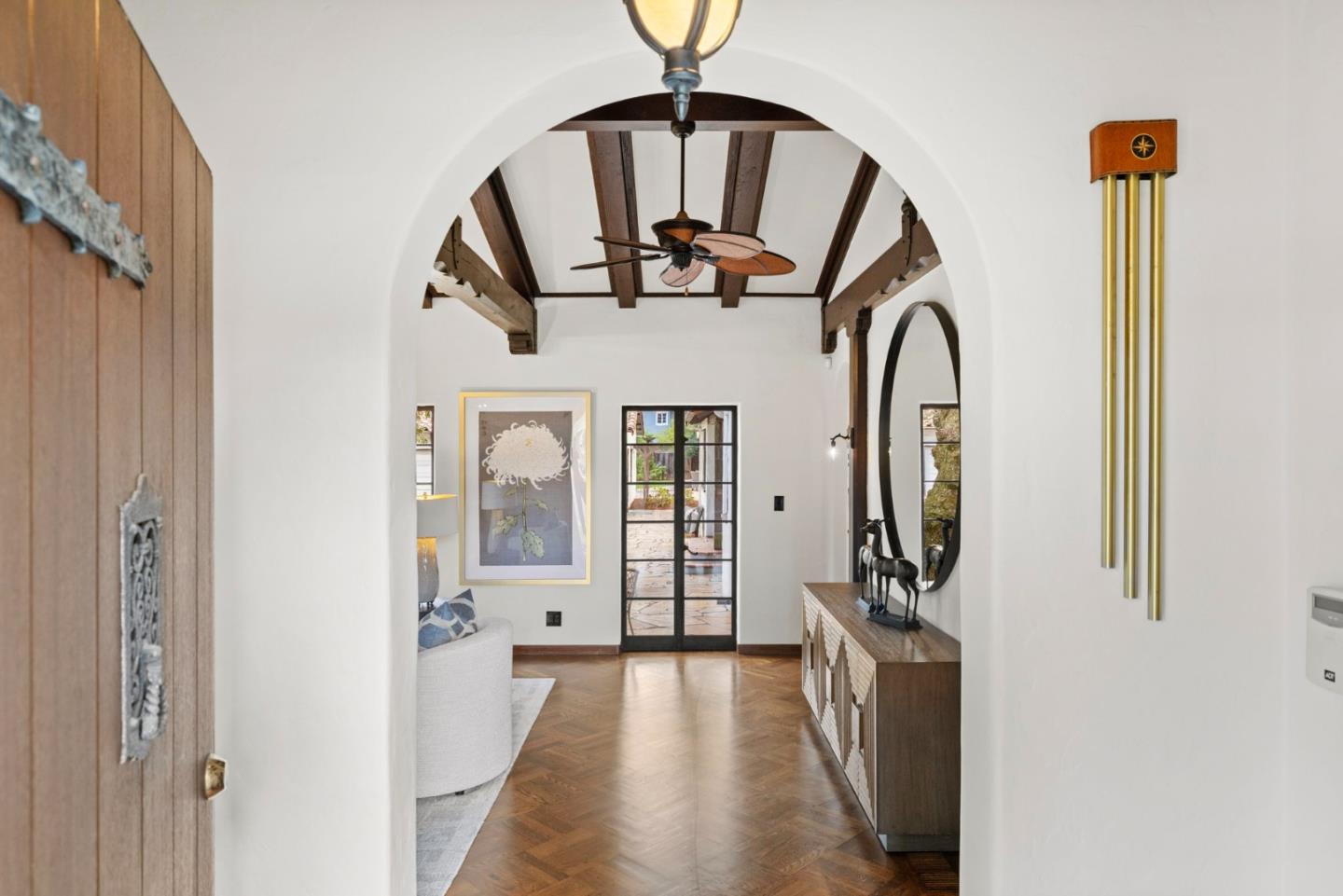 503 Arlington Road Redwood City, CA 94062 - Photo 3 of 48 a view of a hallway with entryway wooden floor and front door