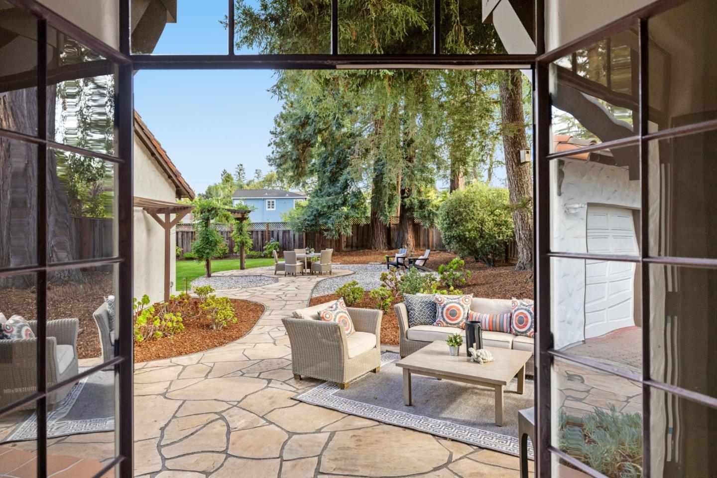 503 Arlington Road Redwood City, CA 94062 - Photo 38 of 48 a outdoor space with lots of tables a garden view and chairs