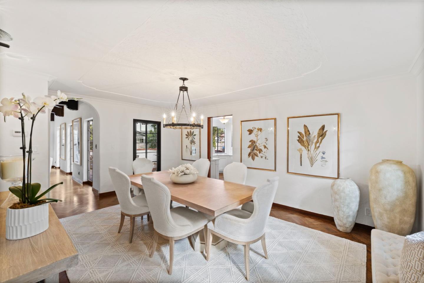 503 Arlington Road Redwood City, CA 94062 - Photo 8 of 48 a view of a dining room with furniture and wooden floor