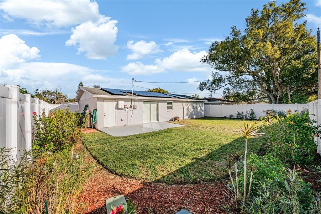 4626 Abdella Lane Holiday, FL 34690 - Photo 14 of 34 a view of a house with a yard and sitting area