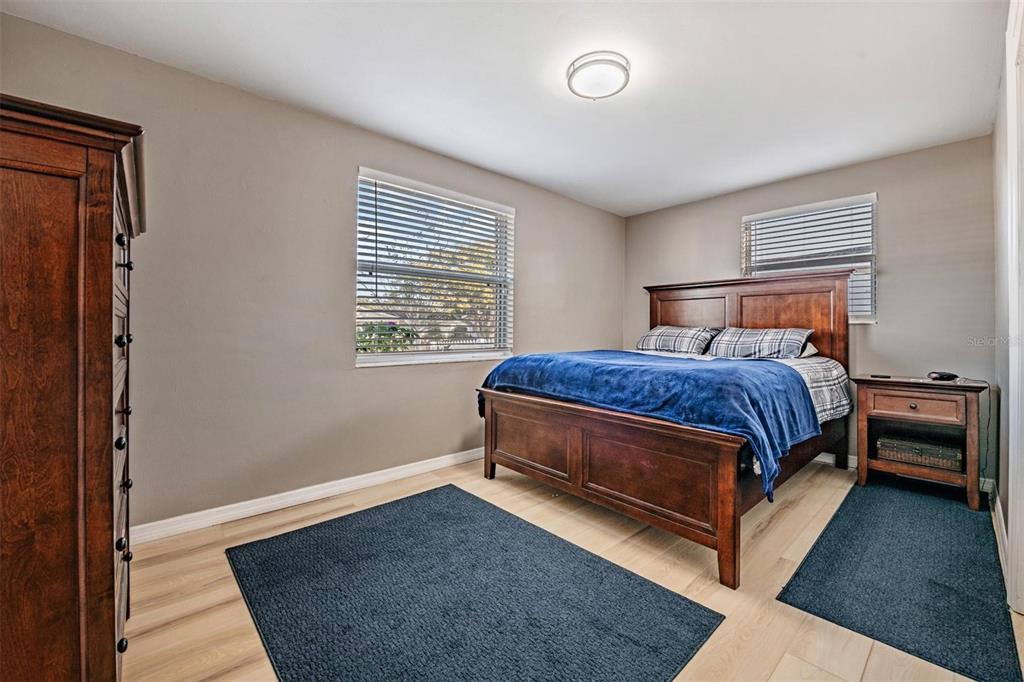 4626 Abdella Lane Holiday, FL 34690 - Photo 18 of 34 a bedroom with a bed and window