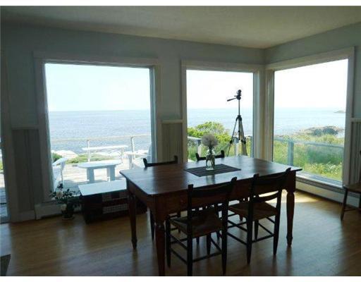 156 Loop Road Georgetown, ME 04548 - Photo 6 of 25 Dining Room. Floor to ceiling...
