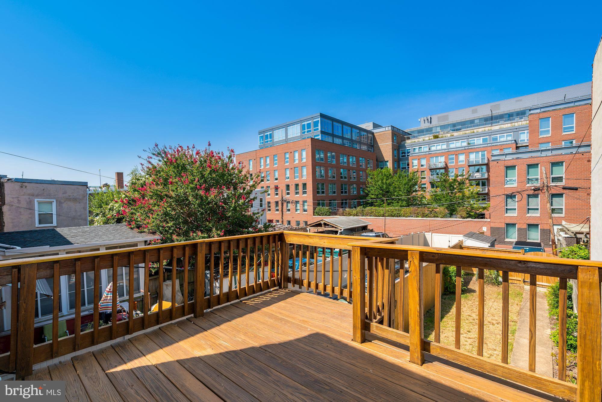 716 3rd Street Northeast Washington, DC 20002 - Photo 19 of 27 Upper Level Deck With View Of The Rear Garden