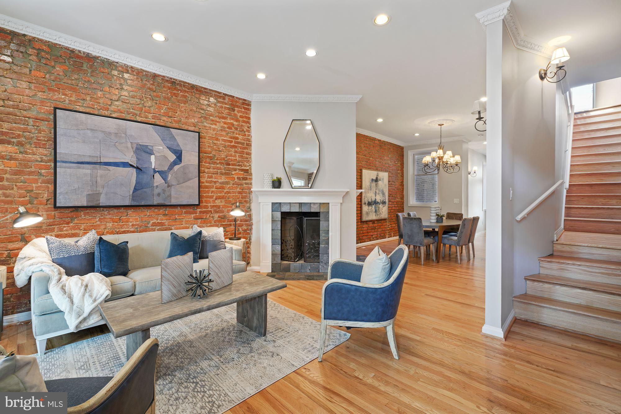 716 3rd Street Northeast Washington, DC 20002 - Photo 3 of 27 Warm Exposed Brick And Wide Open Space
