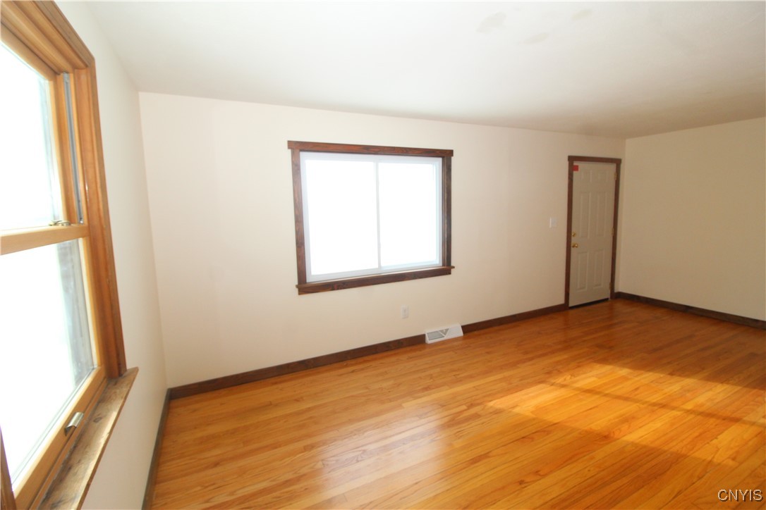 6932 Guyder Road Lysander, NY 13112 - Photo 4 of 23 Glistening Hardwoods Throughout