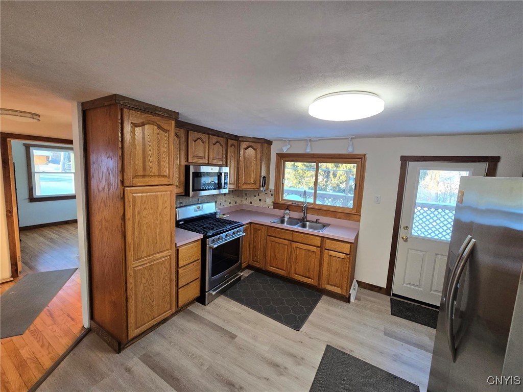 6932 Guyder Road Lysander, NY 13112 - Photo 8 of 23 New Luxury Vinyl & Plenty of Cupboards