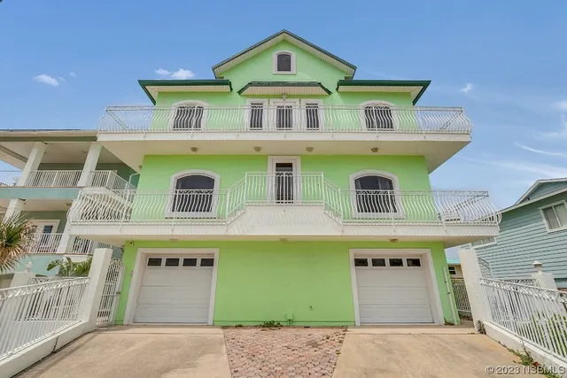 a living room with fireplace furniture and a flat screen tv
