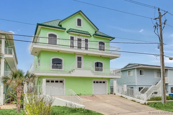a kitchen with stainless steel appliances kitchen island granite countertop a sink and cabinets