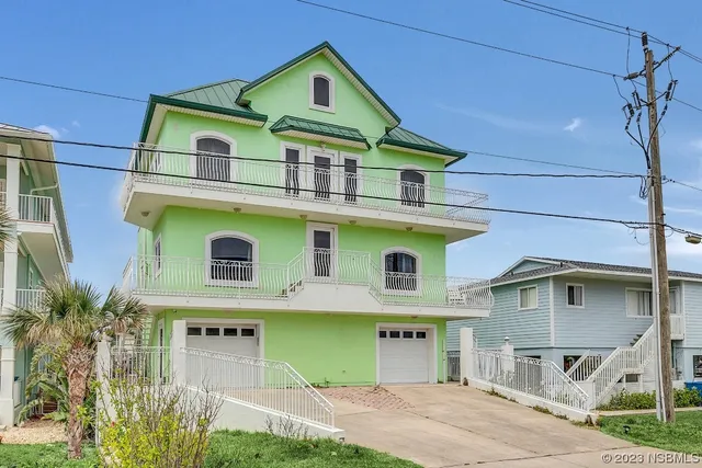a kitchen with stainless steel appliances kitchen island granite countertop a sink and cabinets