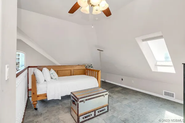 a view of a balcony with an ocean view