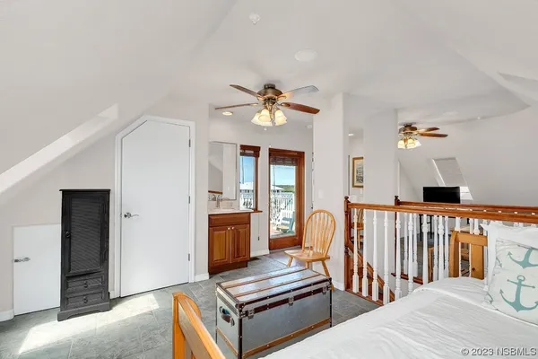 a view of swimming pool with outdoor seating and plants