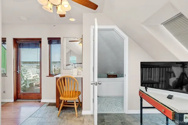 a kitchen with stainless steel appliances a refrigerator sink and cabinets