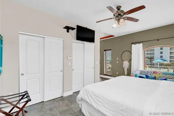 a bathroom with a sink vanity toilet and shower