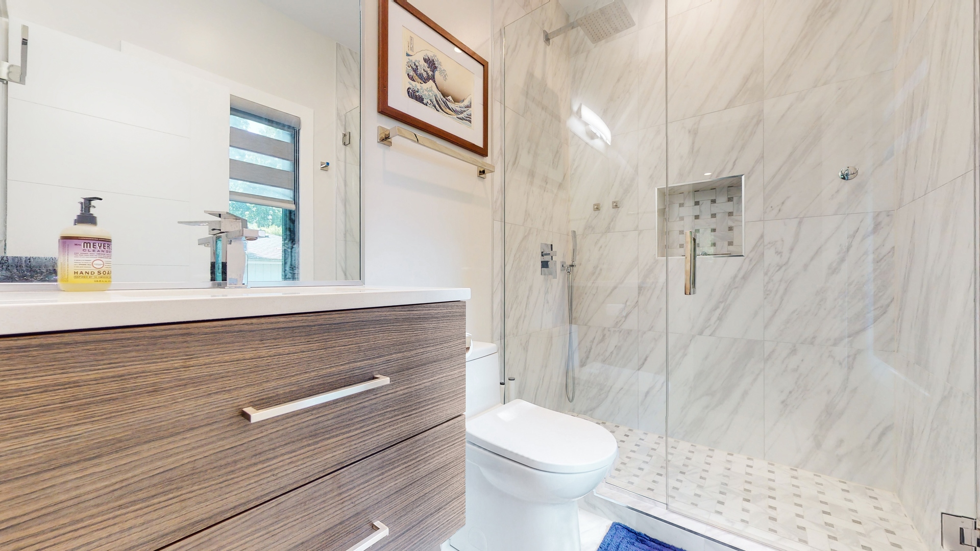 1 A Half Day Road Lincolnshire, IL 60069 - Photo 11 of 37 a bathroom with a sink a toilet and shower