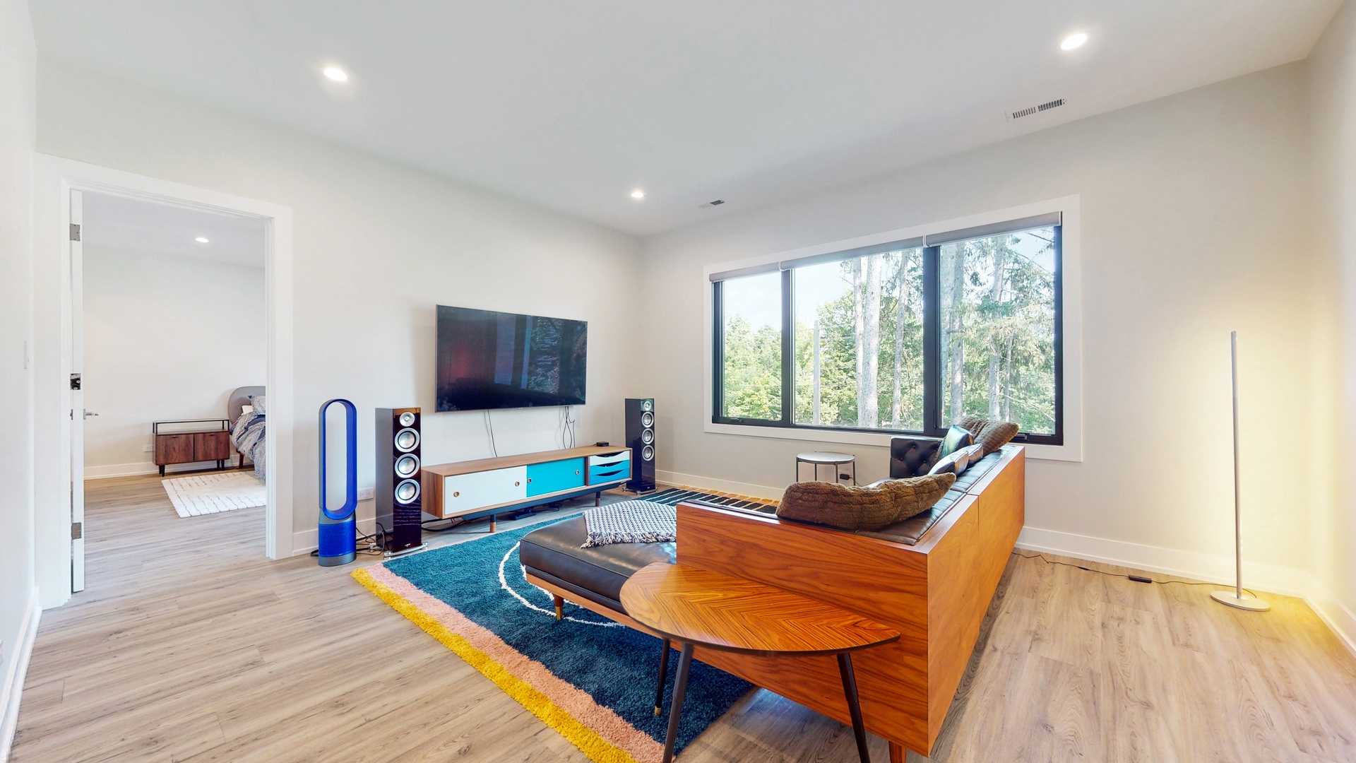 1 A Half Day Road Lincolnshire, IL 60069 - Photo 13 of 37 a living room with furniture and a flat screen tv