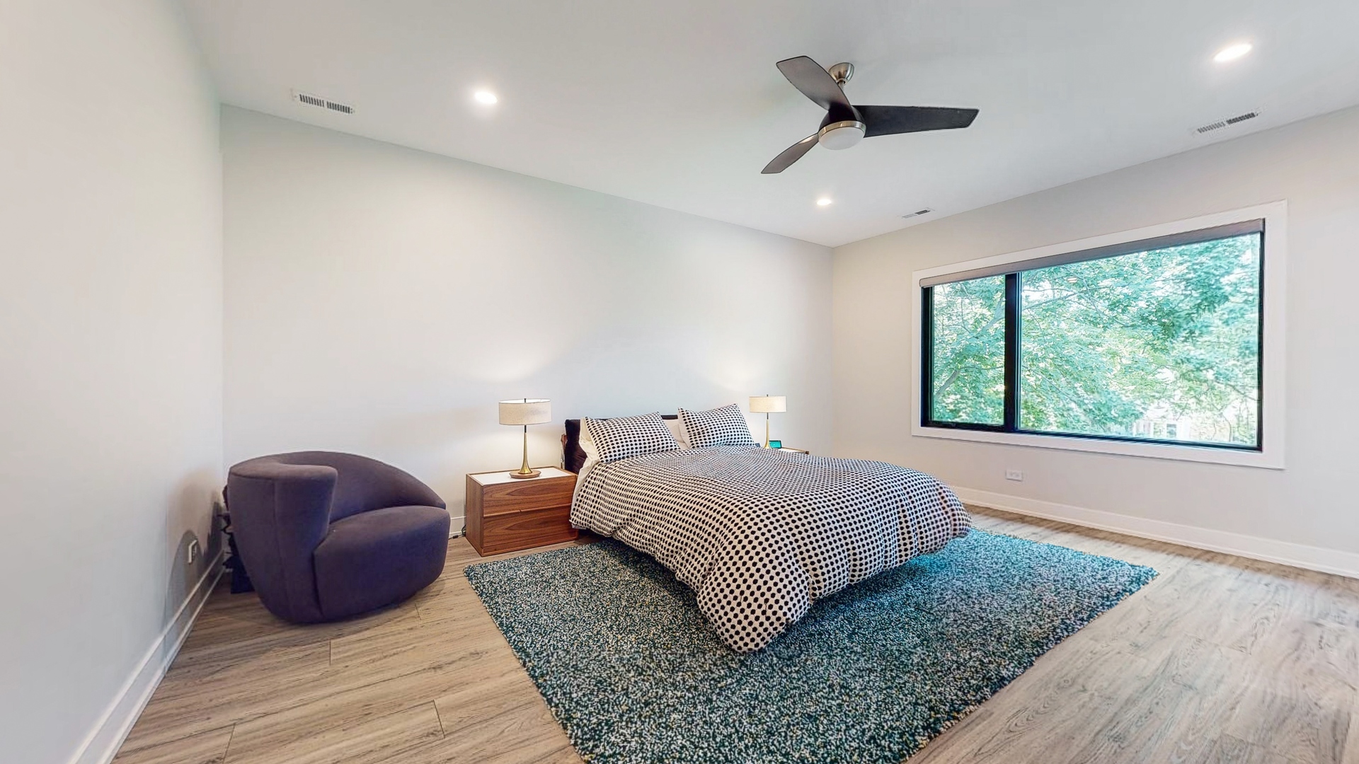 1 A Half Day Road Lincolnshire, IL 60069 - Photo 14 of 37 a bedroom with a large bed and a window