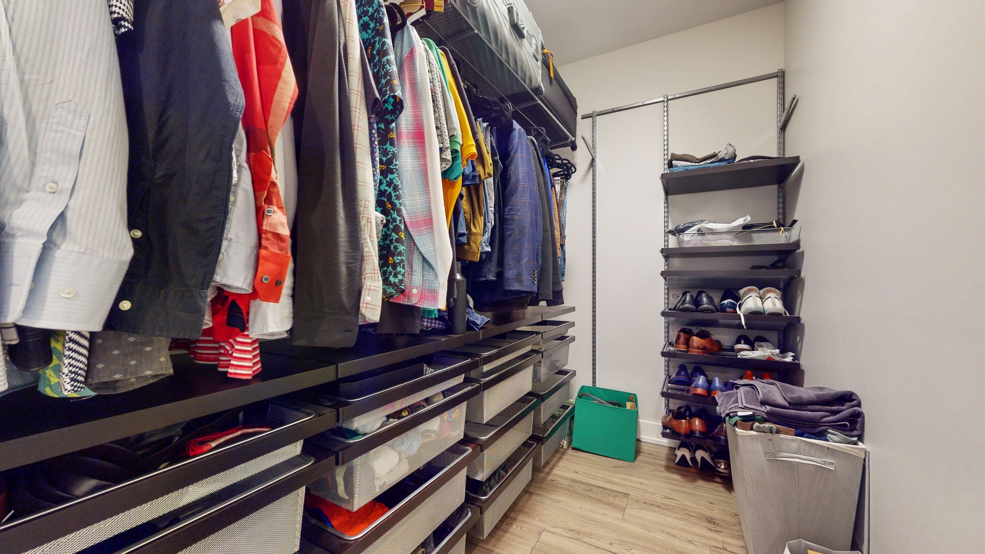 1 A Half Day Road Lincolnshire, IL 60069 - Photo 17 of 37 a room with lots of different colored cloths