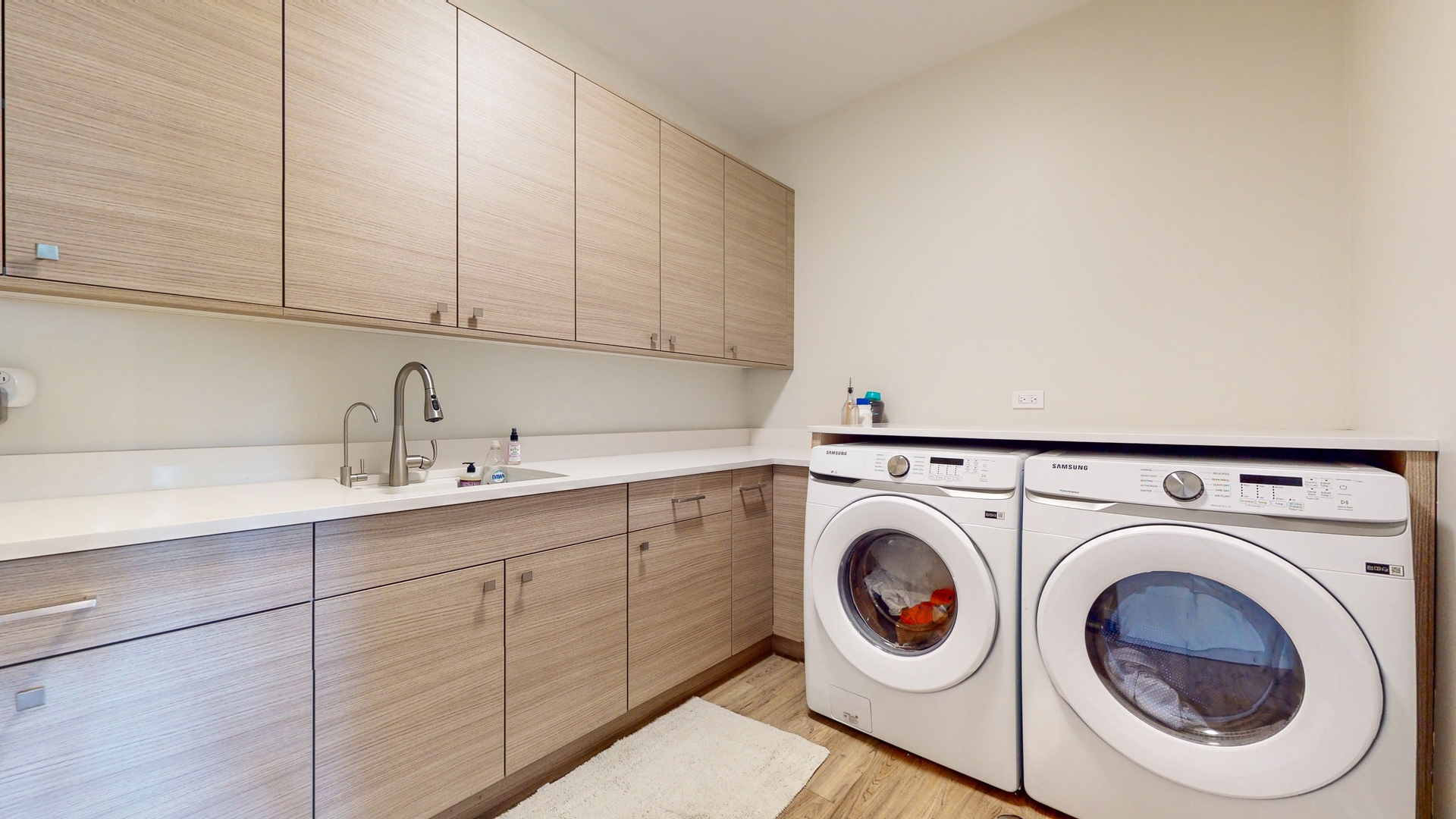 1 A Half Day Road Lincolnshire, IL 60069 - Photo 25 of 37 a utility room with sink dryer and washer