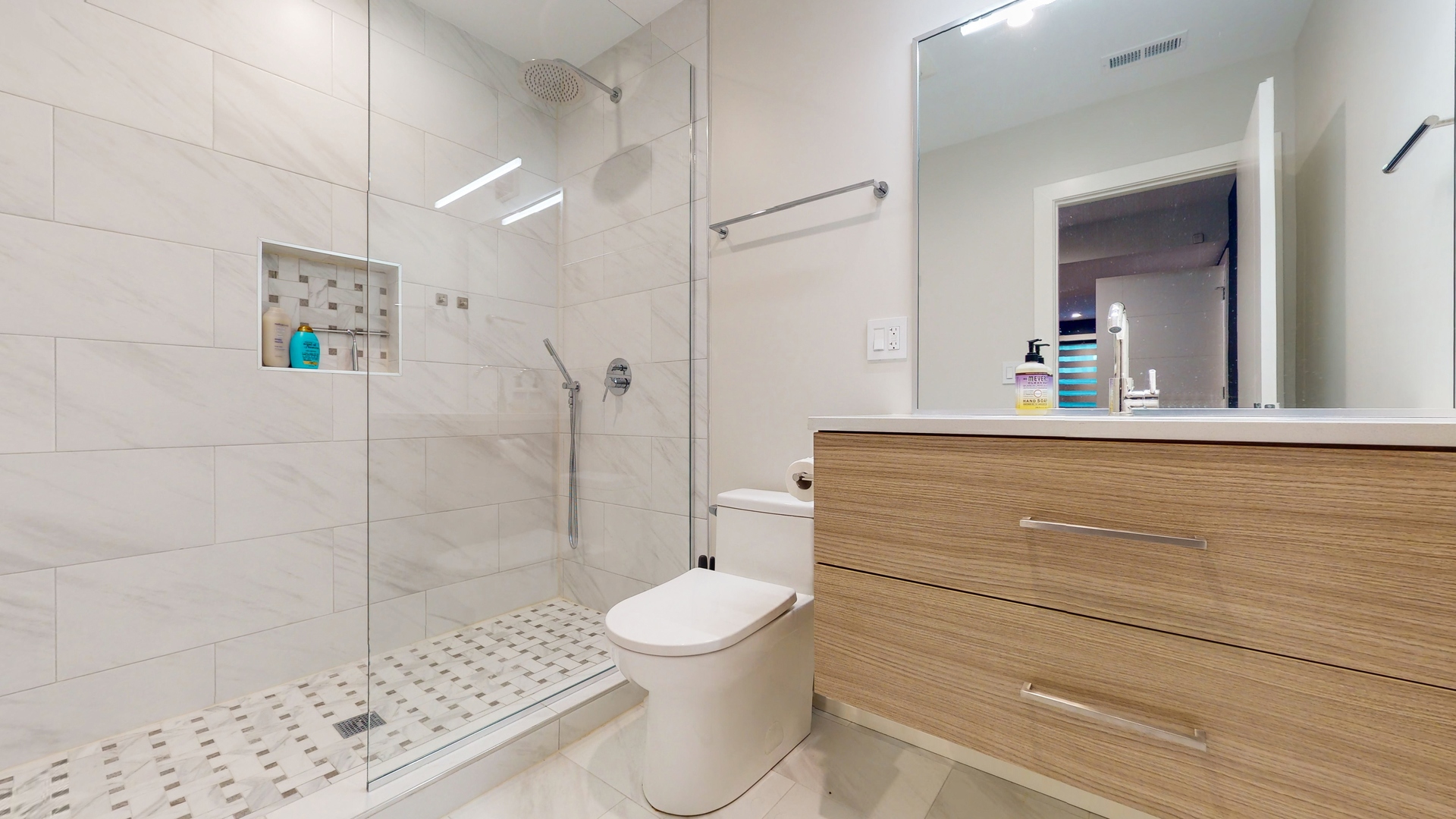 1 A Half Day Road Lincolnshire, IL 60069 - Photo 27 of 37 a bathroom with a toilet and a shower