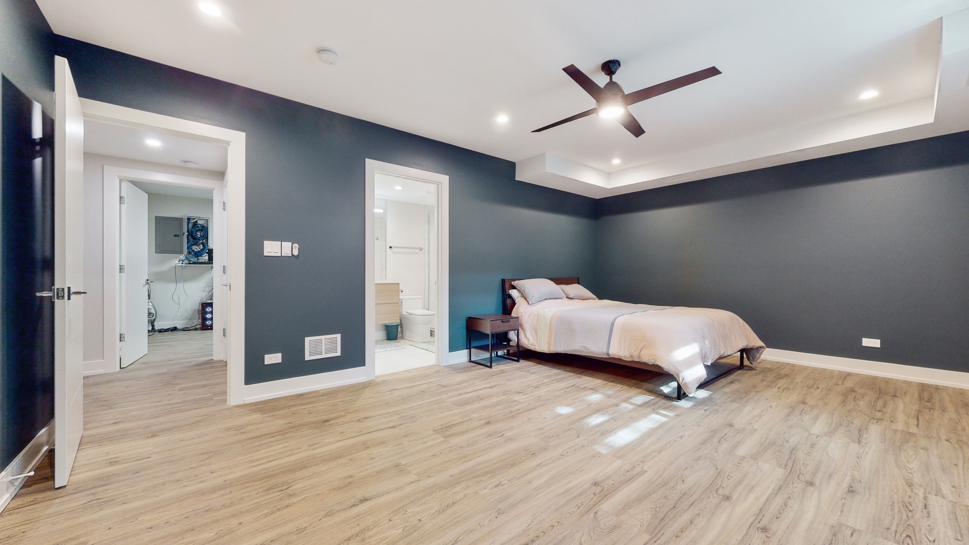 1 A Half Day Road Lincolnshire, IL 60069 - Photo 28 of 37 a bedroom with a bed and a ceiling fan