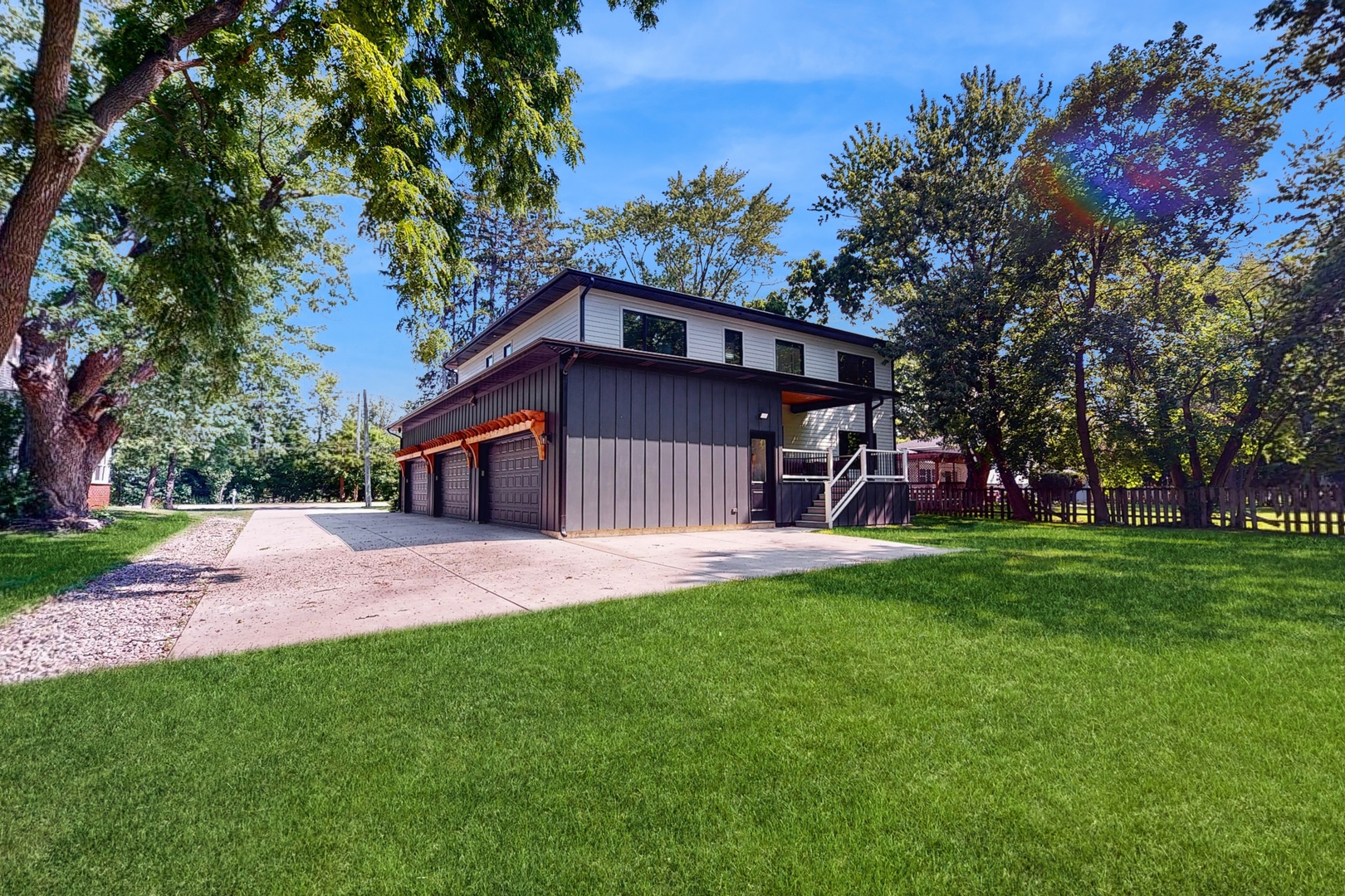 1 A Half Day Road Lincolnshire, IL 60069 - Photo 33 of 37 a front view of a house with a yard and trees