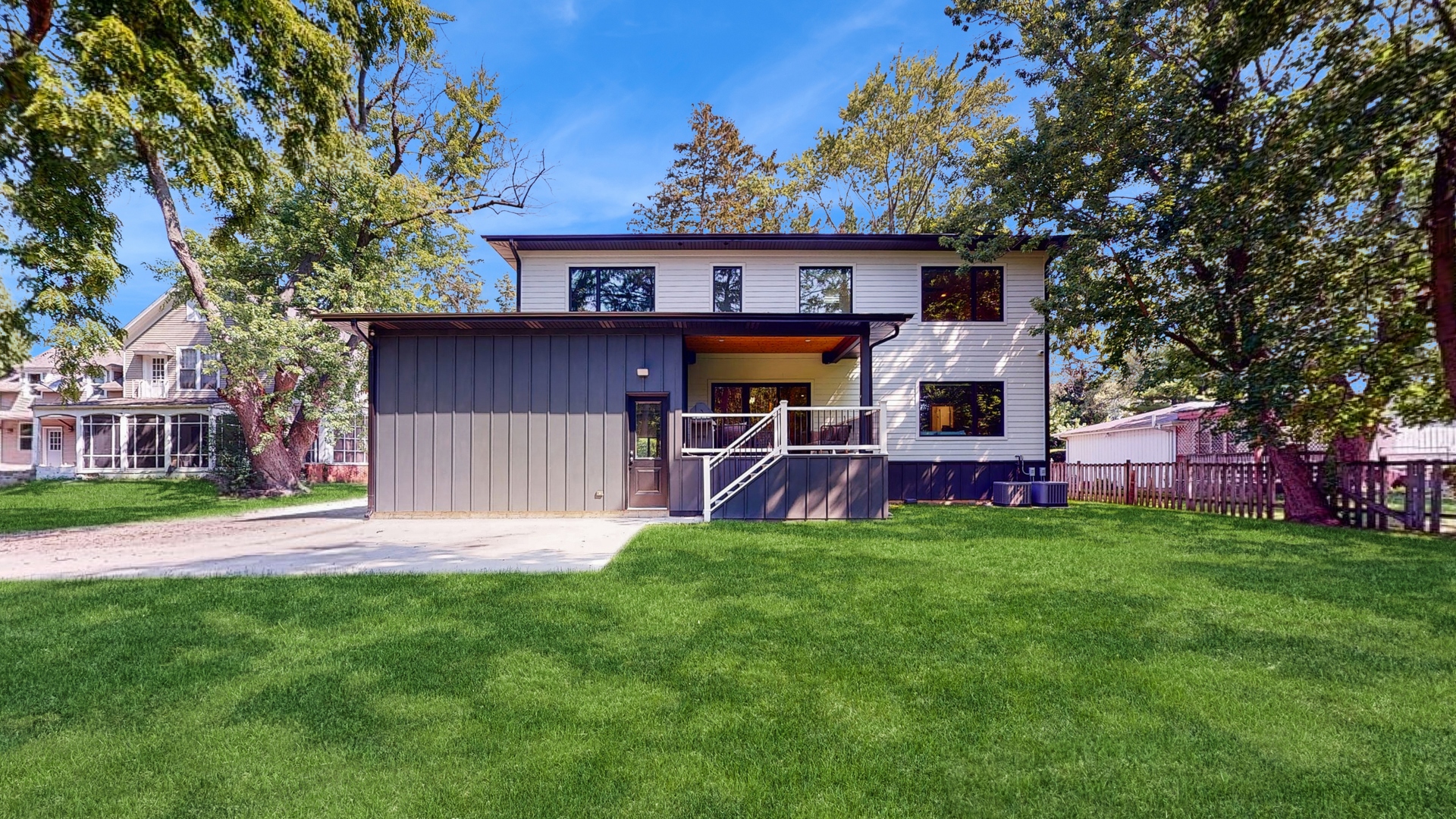 1 A Half Day Road Lincolnshire, IL 60069 - Photo 34 of 37 front view of a house with a yard