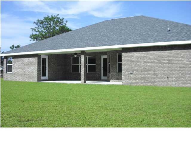 9685 Misty Meadow Lane Navarre, FL 32566 - Photo 17 of 18 a black and white photo of a house