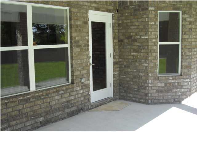 9685 Misty Meadow Lane Navarre, FL 32566 - Photo 18 of 18 a black and white photo of a house