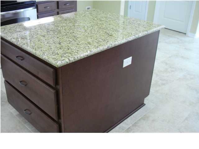 9685 Misty Meadow Lane Navarre, FL 32566 - Photo 7 of 18 a open area with kitchen island