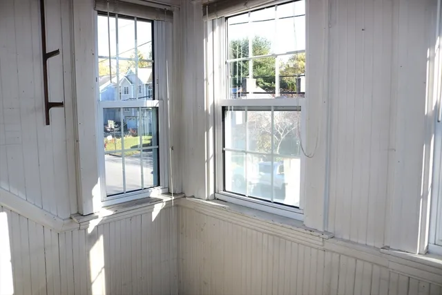 a view of an entryway with a window