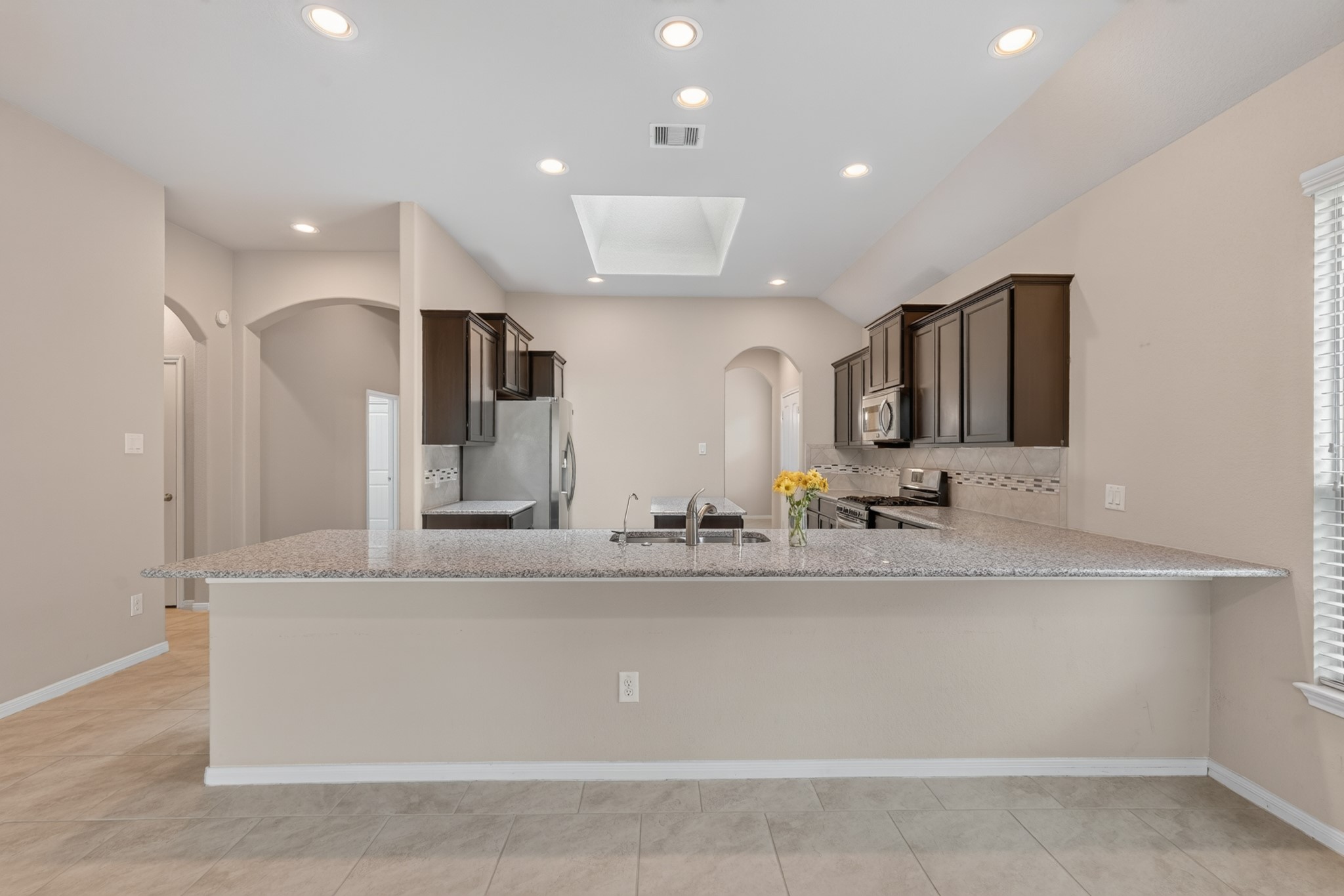 5414 Claymore Meadow Lane Spring, TX 77389 - Photo 12 of 35 Another view of Breakfast bar with kitchen in background.