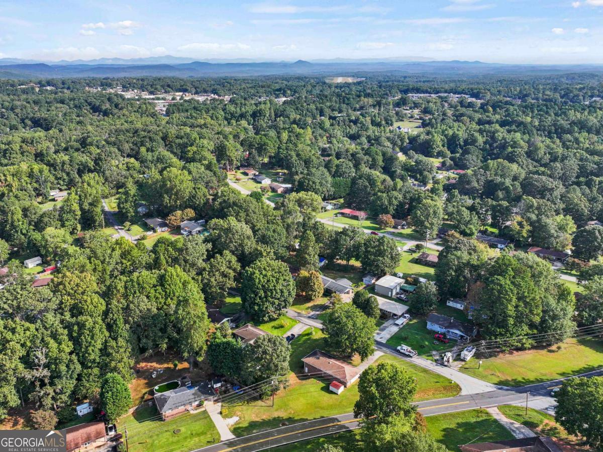 372 Hilltop Way Toccoa, GA 30577 - Photo 37 of 38 an aerial view of residential houses with outdoor space and trees