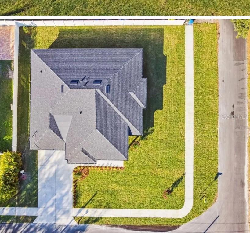 7403 Edgemere Road Tampa, FL 33625 - Photo 3 of 41 a view of swimming pool with a yard