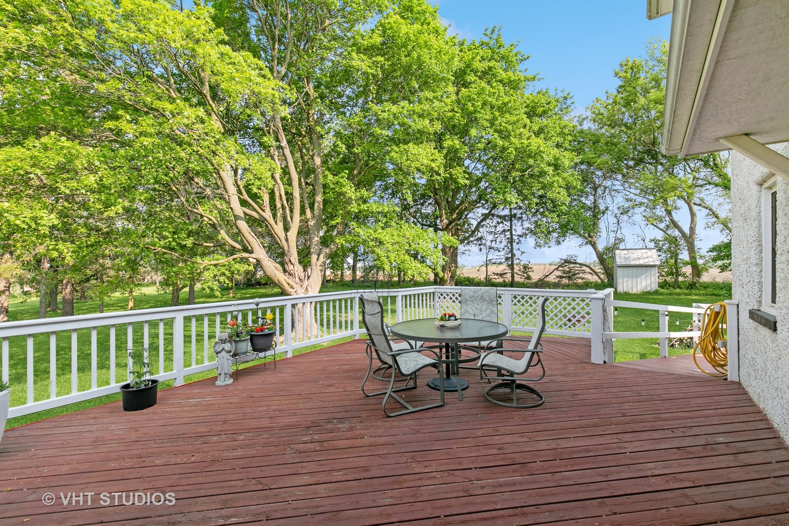 45W740 Read Road Maple Park, IL 60151 - Photo 3 of 26 a view of a chairs and table on the wooden deck