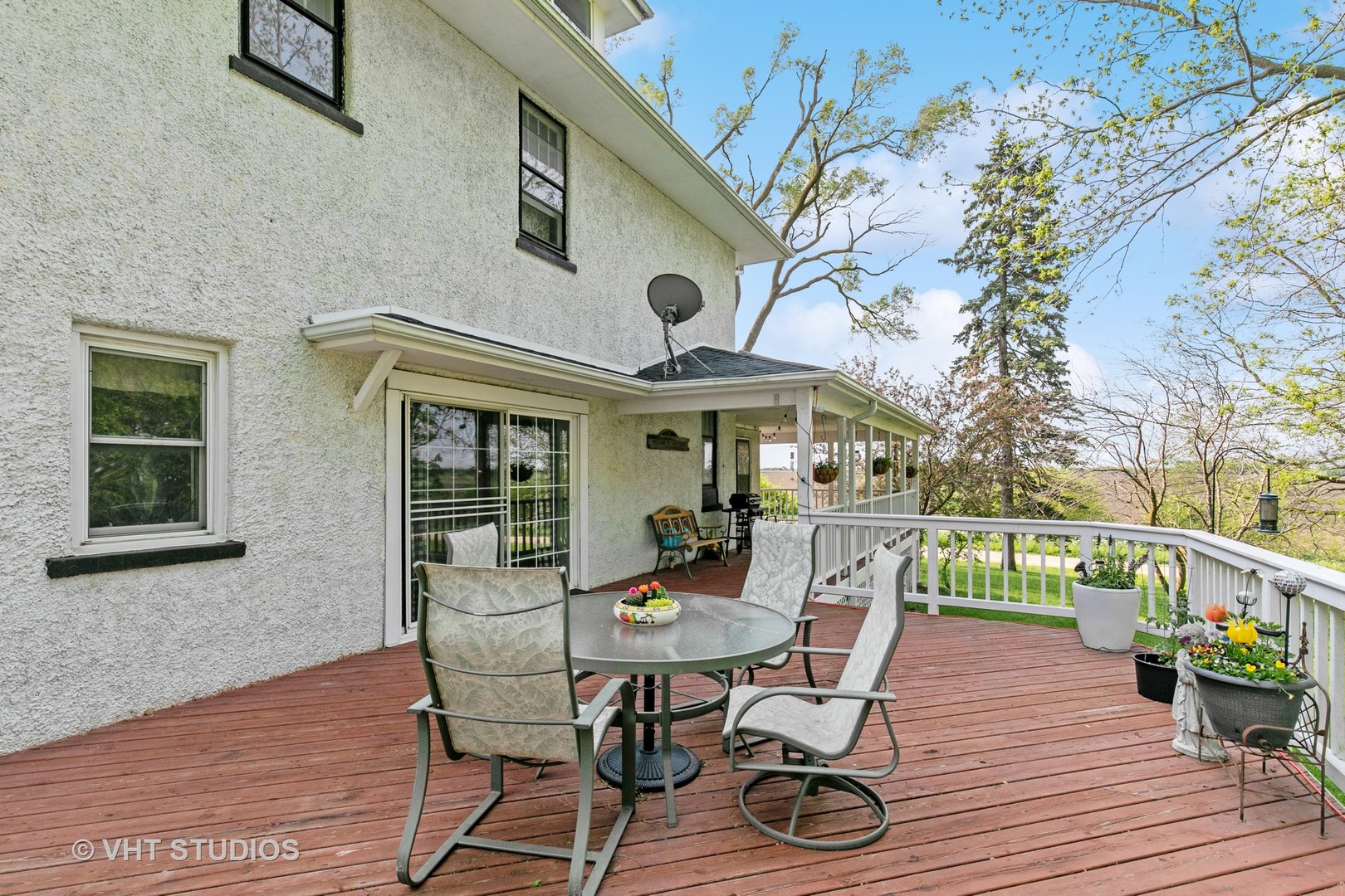45W740 Read Road Maple Park, IL 60151 - Photo 4 of 26 a view of a patio with table and chairs with wooden floor and fence