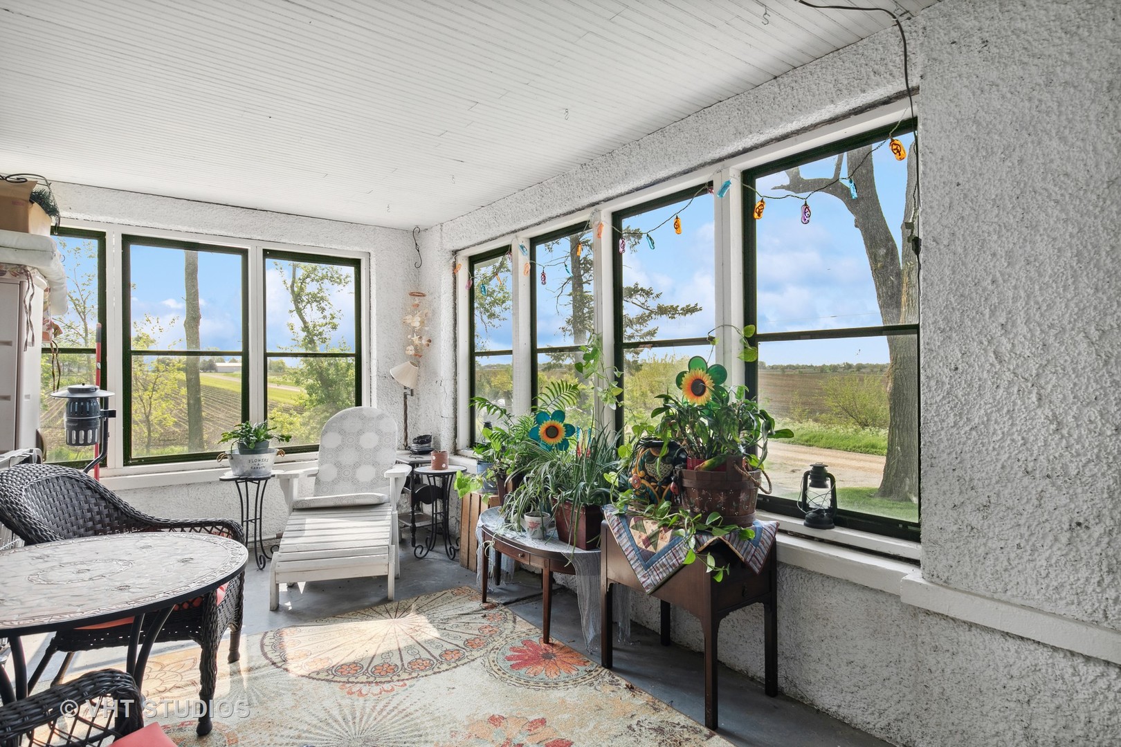 45W740 Read Road Maple Park, IL 60151 - Photo 7 of 26 a living room with furniture and floor to ceiling windows