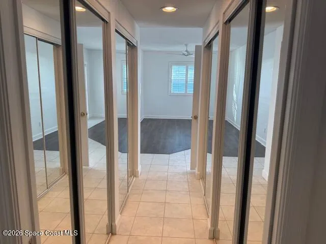 a view of empty room with windows